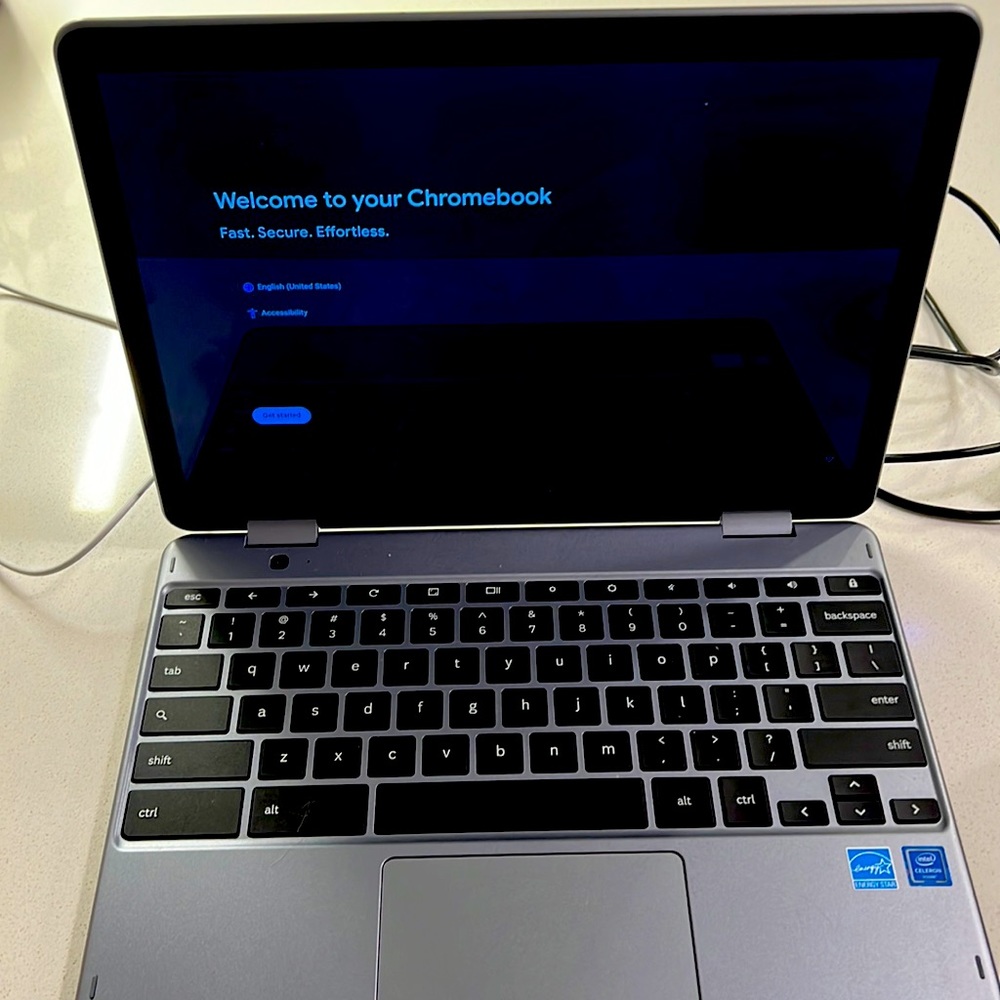 Samsung chrome book with charger.
